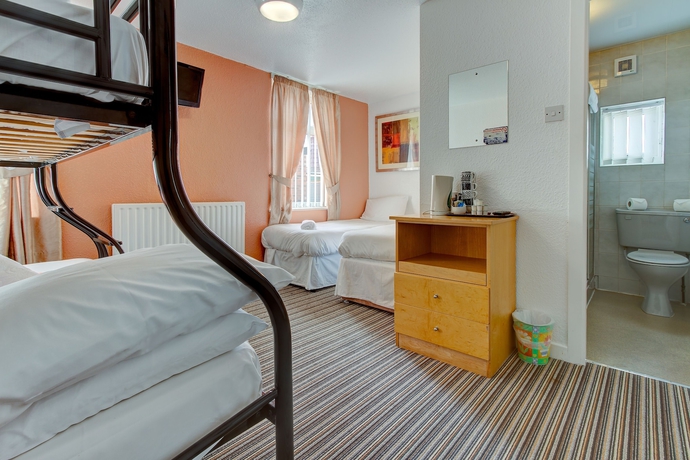 Imagen de la habitación del Hotel The New Sandringham Court. Foto 5