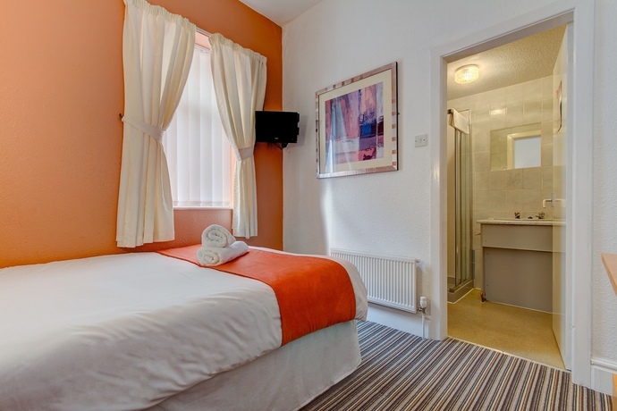 Imagen de la habitación del Hotel The New Sandringham Court. Foto 6