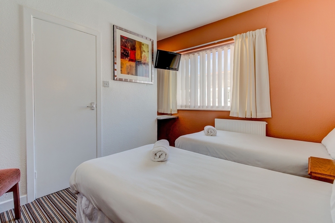 Imagen de la habitación del Hotel The New Sandringham Court. Foto 7