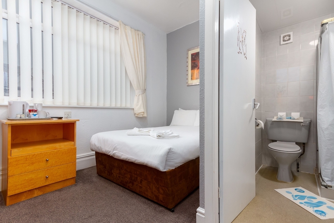 Imagen de la habitación del Hotel The New Sandringham Court. Foto 12