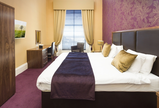 Imagen de la habitación del Hotel The New Town. Foto 2