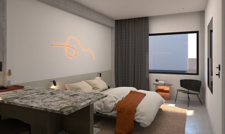 Imagen de la habitación del Hotel The Newel Metaxourgeio. Foto 7