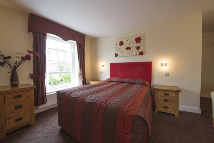 Imagen de la habitación del Hotel The Newtown House. Foto 4