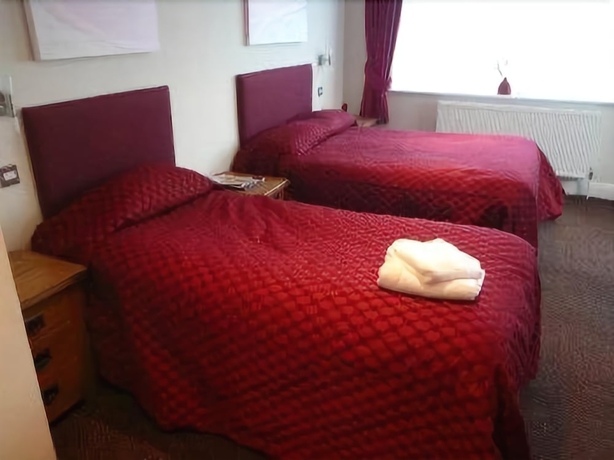 Imagen de la habitación del Hotel The Newtown House. Foto 11