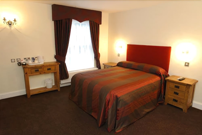 Imagen de la habitación del Hotel The Newtown House. Foto 12