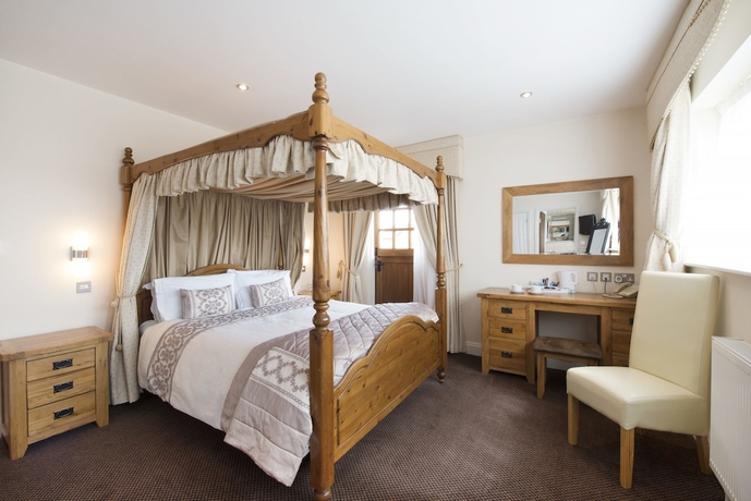 Imagen de la habitación del Hotel The Newtown House. Foto 17