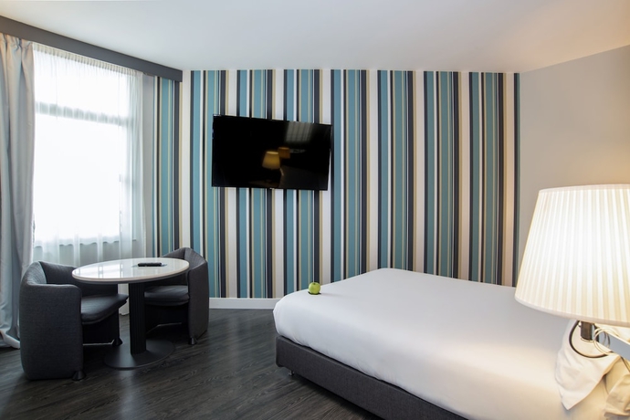 Imagen de la habitación del Hotel The Nicolaus. Foto 16