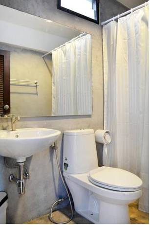 Imagen de la habitación del Hotel The Nidhra. Foto 5