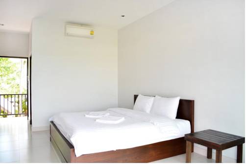 Imagen de la habitación del Hotel The Nidhra. Foto 6