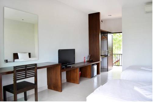 Imagen de la habitación del Hotel The Nidhra. Foto 8