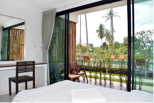 Imagen de la habitación del Hotel The Nidhra. Foto 13