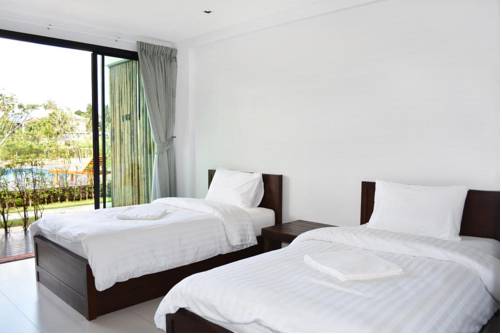 Imagen de la habitación del Hotel The Nidhra. Foto 15