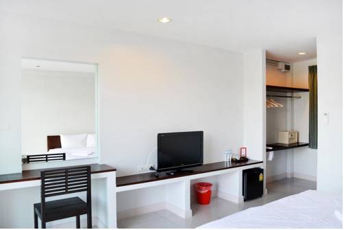 Imagen de la habitación del Hotel The Nidhra. Foto 16