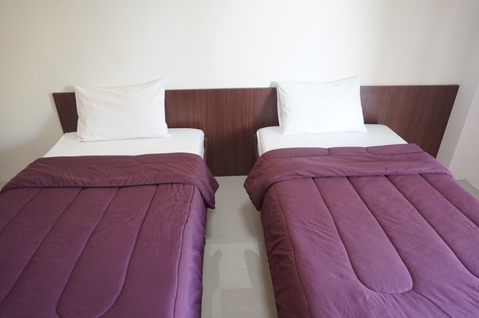 Imagen de la habitación del Hotel The Nine Mansion. Foto 3