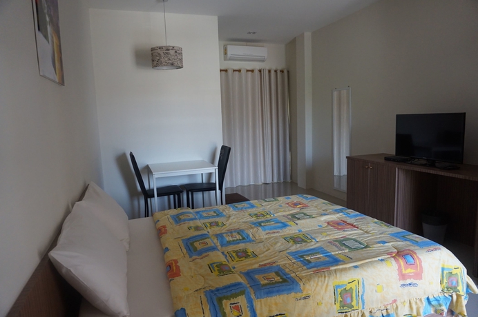 Imagen de la habitación del Hotel The Nine Mansion. Foto 5