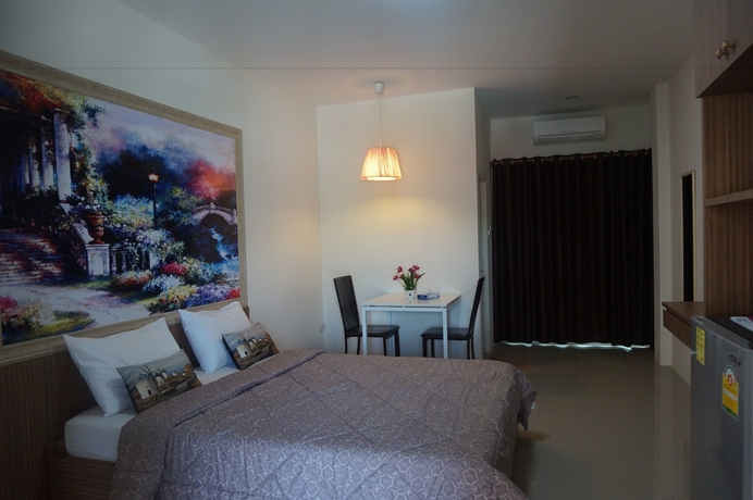 Imagen de la habitación del Hotel The Nine Mansion. Foto 9