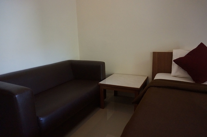 Imagen de la habitación del Hotel The Nine Mansion. Foto 12