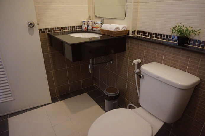 Imagen de la habitación del Hotel The Nine Mansion. Foto 15