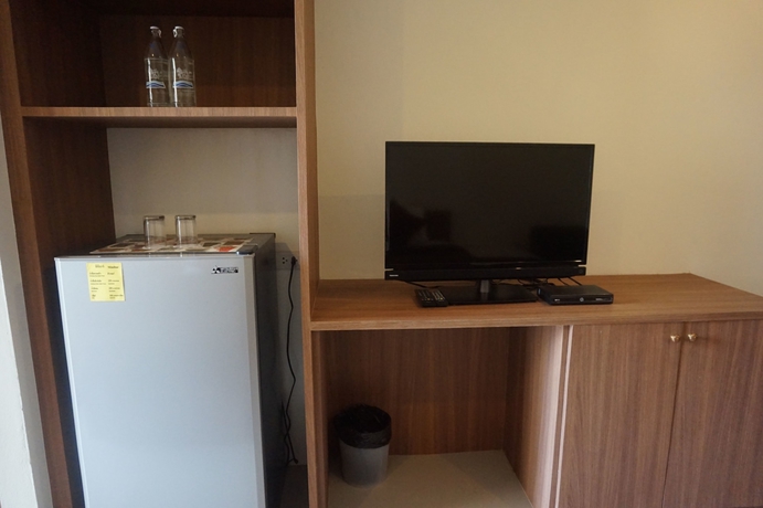 Imagen de la habitación del Hotel The Nine Mansion. Foto 17