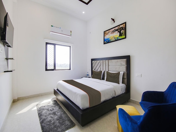 Imagen de la habitación del Hotel The Nines and Restro. Foto 11