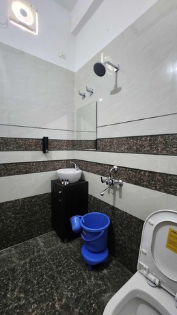 Imagen de la habitación del Hotel The Nines and Restro. Foto 15