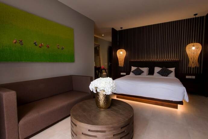 Imagen de la habitación del Hotel The Ning Resort Ubud. Foto 11