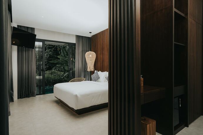 Imagen de la habitación del Hotel The Ning Resort Ubud. Foto 12