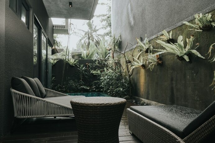 Imagen de la habitación del Hotel The Ning Resort Ubud. Foto 15