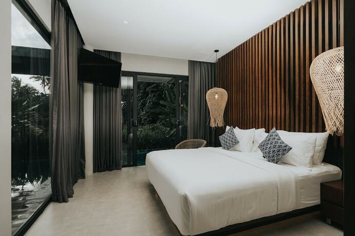 Imagen de la habitación del Hotel The Ning Resort Ubud. Foto 17