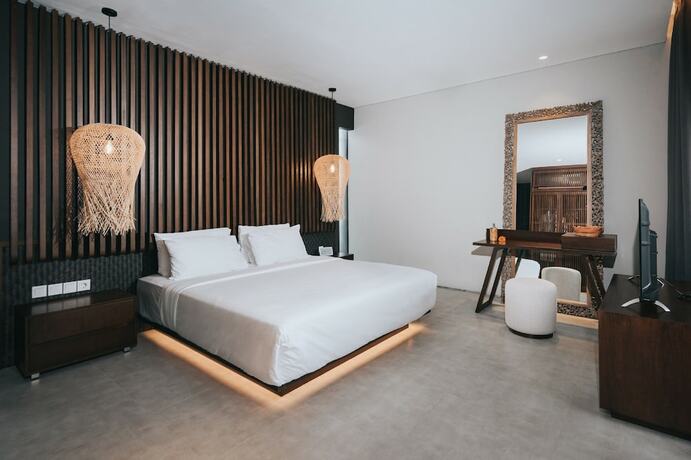 Imagen de la habitación del Hotel The Ning Resort Ubud. Foto 18