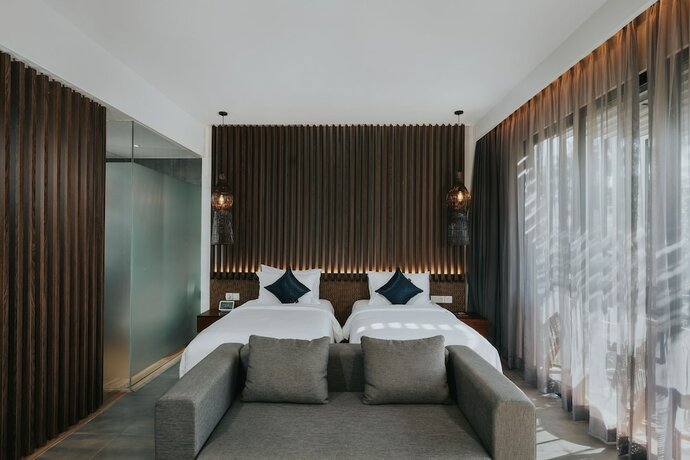 Imagen de la habitación del Hotel The Ning Resort Ubud. Foto 19