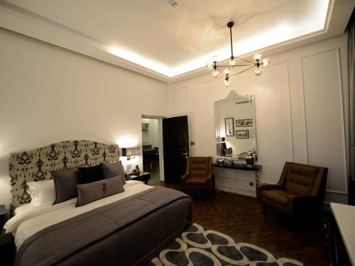 Imagen de la habitación del Hotel The Nishat. Foto 2