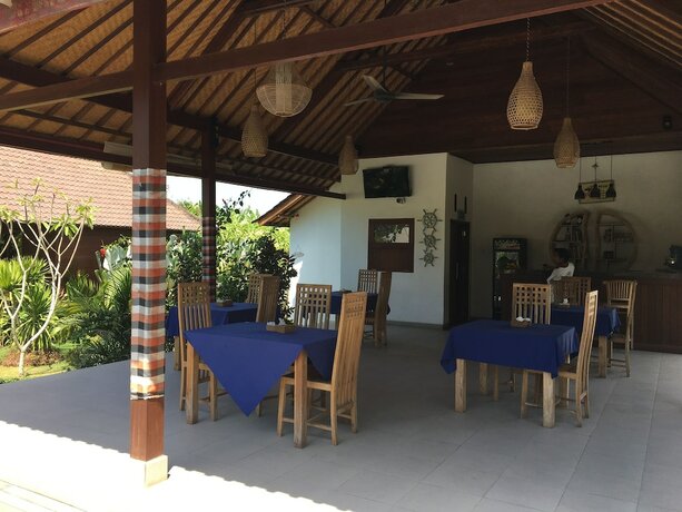 Imagen del bar/restaurante del Hotel The Niti Hut's. Foto 21