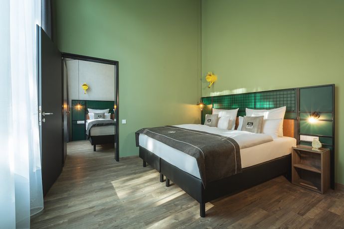 Imagen de la habitación del Hotel The Niu Dwarf. Foto 4