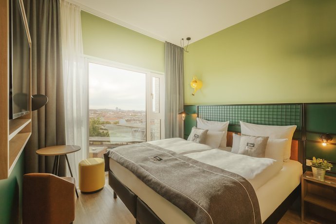 Imagen de la habitación del Hotel The Niu Dwarf. Foto 8