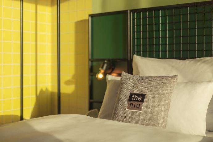 Imagen de la habitación del Hotel The Niu Dwarf. Foto 11