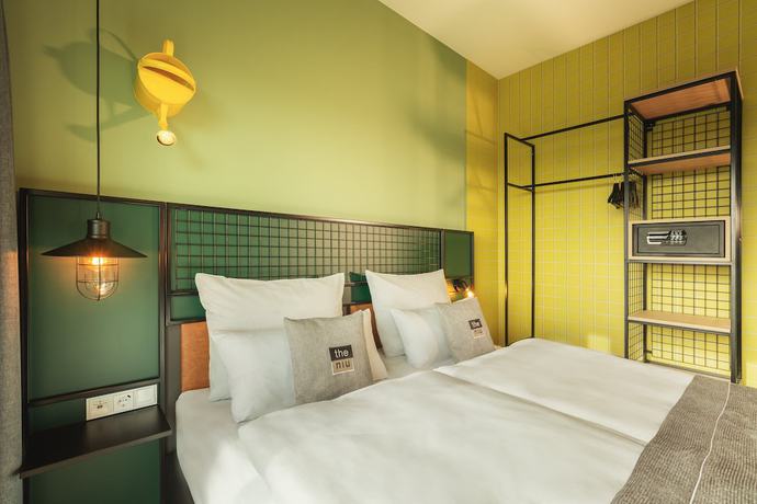 Imagen de la habitación del Hotel The Niu Dwarf. Foto 14