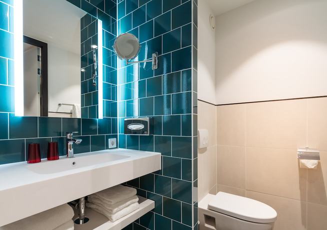 Imagen de la habitación del Hotel The Niu Fender. Foto 5