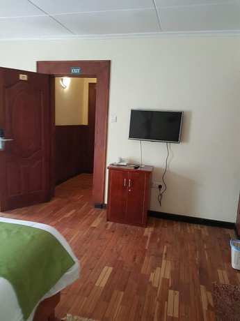 Imagen de la habitación del Hotel The Noble And Conference Center. Foto 10