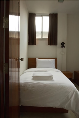 Imagen de la habitación del Hotel The Nook, Bangkok. Foto 8