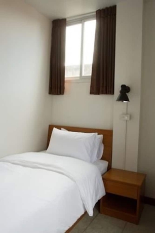 Imagen de la habitación del Hotel The Nook, Bangkok. Foto 11