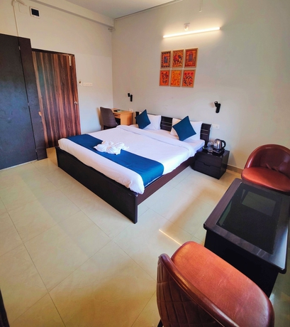 Imagen de la habitación del Hotel The Nook, Bhubaneshwar. Foto 2