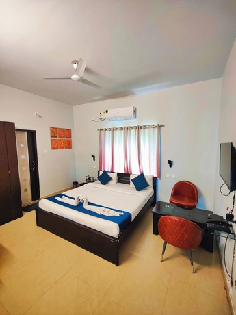 Imagen de la habitación del Hotel The Nook, Bhubaneshwar. Foto 11