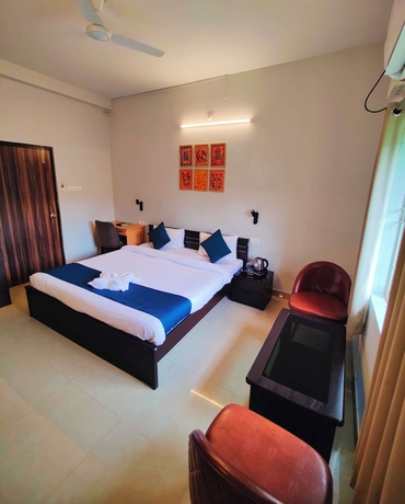 Imagen de la habitación del Hotel The Nook, Bhubaneshwar. Foto 12