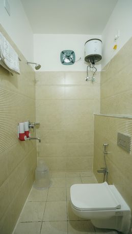 Imagen de la habitación del Hotel The Nook, Bhubaneswar. Foto 12