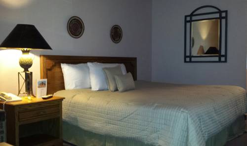 Imagen de la habitación del Hotel The Noor. Foto 7