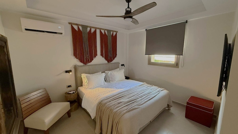 Imagen de la habitación del Hotel The Noverian Antama Organic Beach Resort Chania. Foto 2