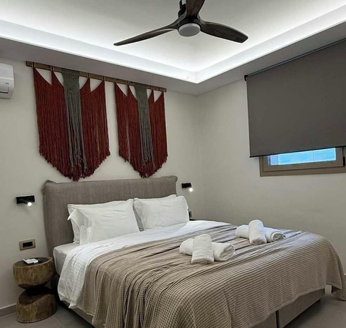 Imagen de la habitación del Hotel The Noverian Antama Organic Beach Resort Chania. Foto 3