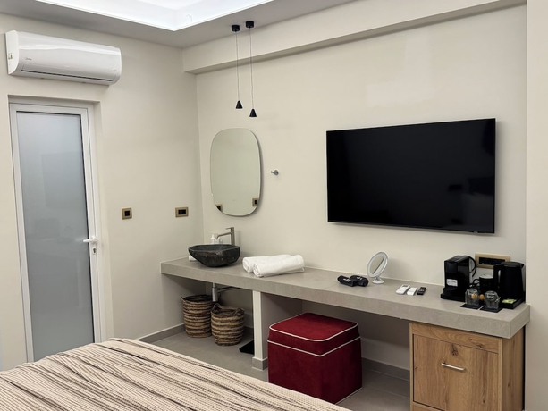 Imagen de la habitación del Hotel The Noverian Antama Organic Beach Resort Chania. Foto 5