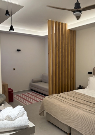 Imagen de la habitación del Hotel The Noverian Antama Organic Beach Resort Chania. Foto 8
